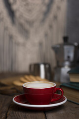 a cup coffee and moka with milk jug