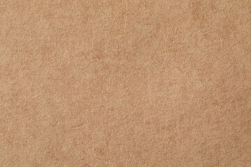 Texture of kraft paper sheet as background, closeup