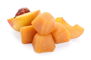 Frozen nectarine puree cubes and ingredients on white background