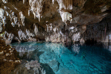 Cenote cave lake, Chichen Itza, Mexico. Cenote Zapote. Natural sinkhole pond with crystal clear water.