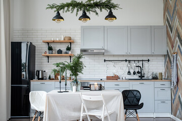 Modern kitchen interior decorated for Christmas