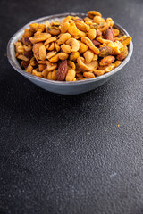 nut mix almond, cashew, pistachio, peanut fresh nuts meal food snack on the table copy space food background rustic top view