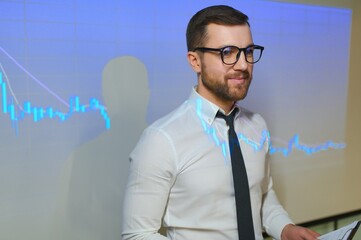 Stock Market Trader Working Investment Charts, Graphs, Ticker, Diagrams Projected on His Face. Financial Analyst and Digital Businessman Selling Shorts and Buying Longs