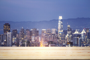 Blank wooden tabletop with beautiful San Francisco skyline at night on background, mockup