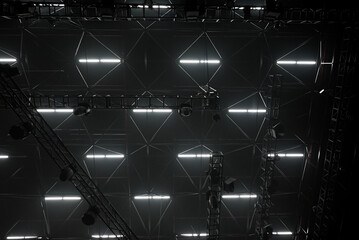 Dark background, ceiling light equipment, light black trusses.
