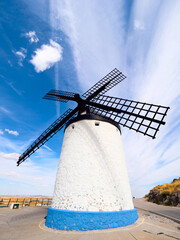 Windmills in the town of Consuegra de Toledo on a summer afternoon.