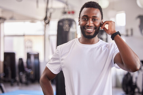 Portrait of black man, personal trainer at gym and workout athlete ready for fitness exercise, healthy body and a wellness training. Face of strength, muscle development and a physical health coach