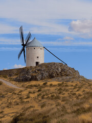 Windmills in the town of Consuegra de Toledo on a summer afternoon.