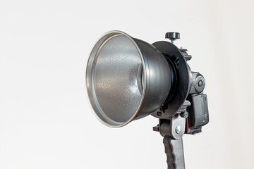 A reflector for photographing complete with a flash on a white background