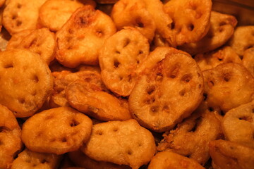close up crispy fried folder of lotus root. Traditional cuisine of Hubei, China