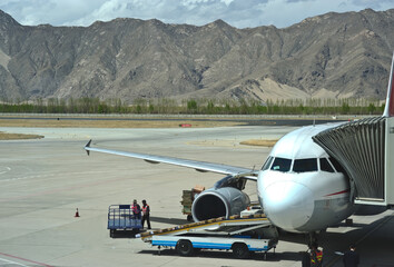  Tibet airport with a view of the mountains and blue sky