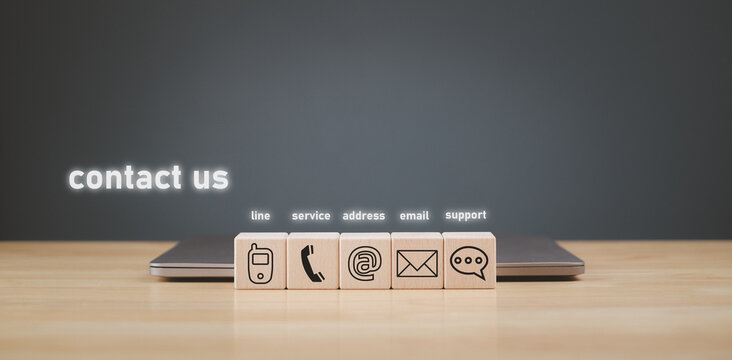 website page contact us or email marketing hotline business leading organization world class customer support contact us cube with email phone address chat message icon on the computer