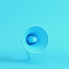 Loudspeaker or megaphoneon bright blue background in pastel colors