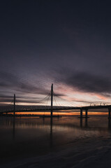 Fototapeta na wymiar Cable-stayed bridge in the evening at sunset