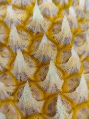 Pineapple skin that is still yellow, ripe and delicious.