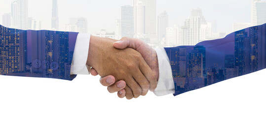 Businessmen shaking hands against the backdrop of the blue sky and buildings on fine day.