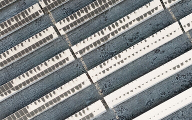 Aerial view of snow covered solar panels