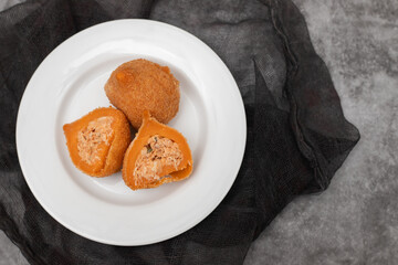 traditional brasilian fried drumsticks Coxinha de frango on dish