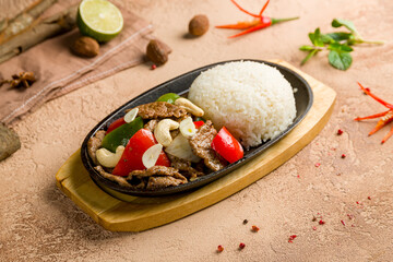Fried rice with beef and vegetables with cashew in Thai, vietnamese cuisine