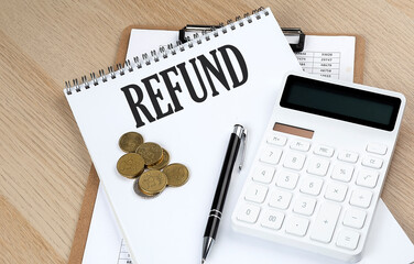 REFUND text with chart and calculator and coins , business concept