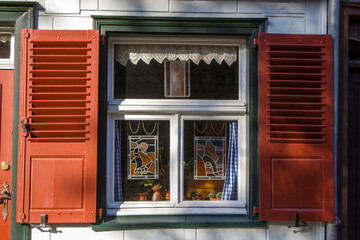 Fototapeta na wymiar windows - picturesque house in the historic center of Monschau, Germany
