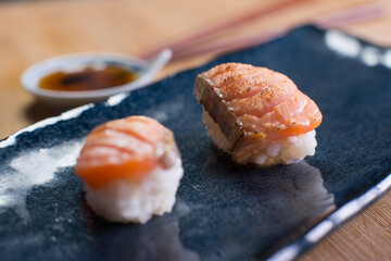 Salmon nigiri in a Japanese sushi restaurant in Tokyo