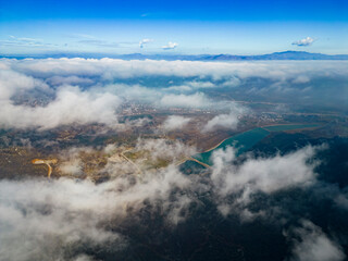 Enormous and mysterious misty views of the city from the peaks of the mountains