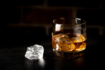 Whiskey with ice in glasses