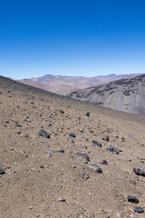 View of the breathtaking landscape at Paso Vergara / Paso del Planchón in Argentina while climbing up to the complex of the three volcanos Azufre, Peteroa and Planchón