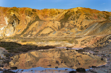 Fototapeta na wymiar Foreground reflections of an abandoned copper mine