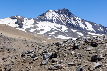 View of the breathtaking landscape at Paso Vergara / Paso del Planchón in Argentina while climbing up to the complex of the three volcanos Azufre, Peteroa and Planchón