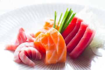 Sashimi Sushii Set with different kinds of fish like tuna and salmon.