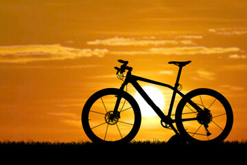 Fototapeta na wymiar silhouette of a bicycle on a sunset
