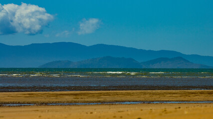 Beautiful day on Balgal Beach in Queensland, Australia. Idyllic tropical beach with yellow sand near Townsville. 