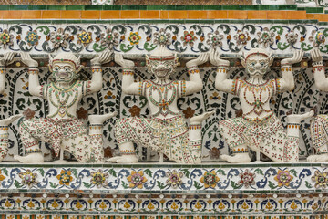 Mythological creatures on Temple of Dawn wall; Bangkok, Thailand