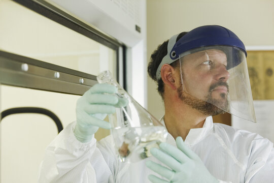Scientist holding a flask