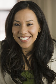 Close-up of a Hispanic woman smiling