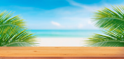 Top wood table and palm tree and tropical beach background.Empty ready for your product display montage.