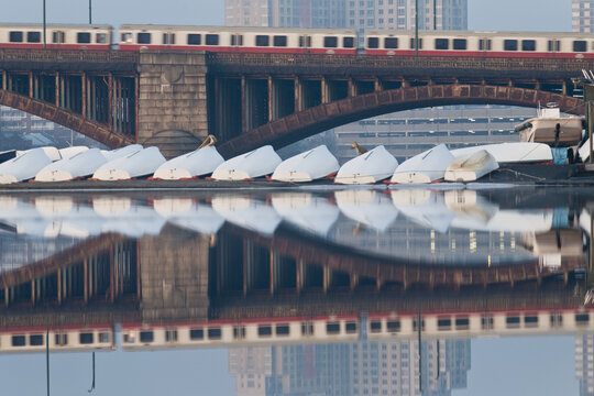 Train moving on the bridge with sail boats in the river, Longfellow Bridge, Charles River, Boston, Suffolk County, Massachusetts, USA