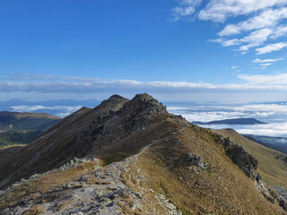 Panoramic view of mountain peak Kreiskogel and Scharfes Eck, Seetal Alps, Styria (Steiermark), Austria, Europe. Idyllic hiking trails in sunny summer over alpine green pastures and ridges