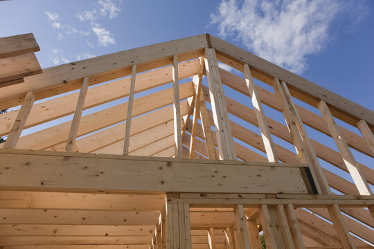 Low angle view of roof framing for a house