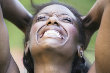Close-up of a mid adult woman screaming in joy