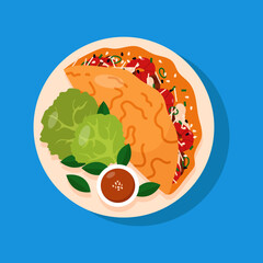 Vietnamese stuffed rice pancake. Banh xeo isolated on blue background.