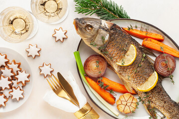 Fried carp whole, coocies and festive drink.  Czech Traditional Christmas Food. Top view.