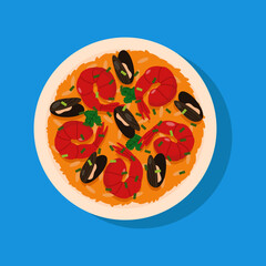Paella with prawns, rice, mussels  and greens. Valencian dish isolated on blue background.