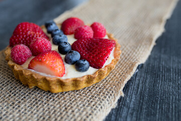Strawberry fruit tart on burlap