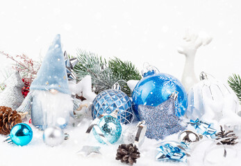 Scandinavian gnome and various Christmas toys on white background. Christmas tree decorations. The concept of the New Year and Christmas. Can be used on postcards, banners, flyers.