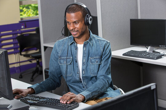 Man who had Spinal Meningitis in a wheelchair working in a call center