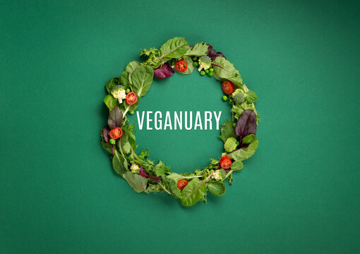 Fresh Vegetables and Plant Based Protein Food on Green Background, Veganuary concept.