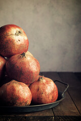 Pomegranates on a metal tray
